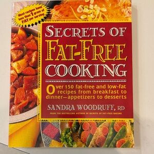 Secrets of Fat-Free Cooking by Sandra Woodruff - Red Cover